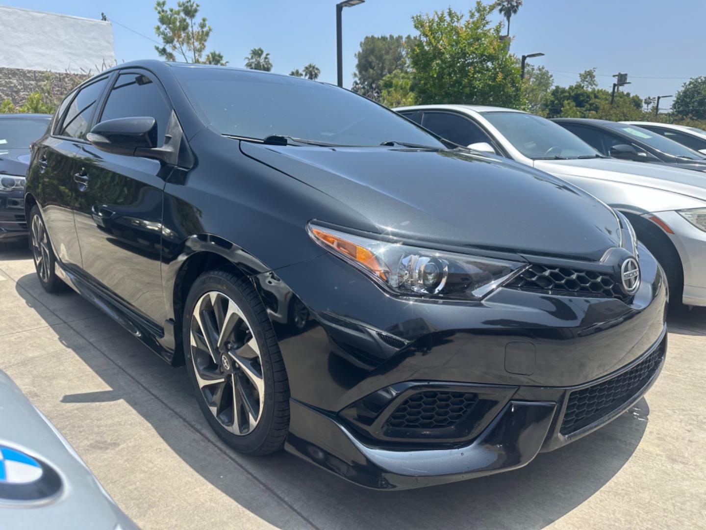 2016 Black /Black Scion iM Cloth (JTNKARJE7GJ) with an 1.8 4 Cylinder engine, Automatic transmission, located at 30 S. Berkeley Avenue, Pasadena, CA, 91107, (626) 248-7567, 34.145447, -118.109398 - 2016 Scion iM 1.8: Your Ideal Pre-Owned Hatchback in Pasadena, CA When searching for used BHPH cars in Pasadena, CA, the 2016 Scion iM 1.8 stands out as a premier choice. This versatile hatchback combines efficiency, style, and practicality, making it a highly sought-after vehicle in the pre-owned - Photo#18